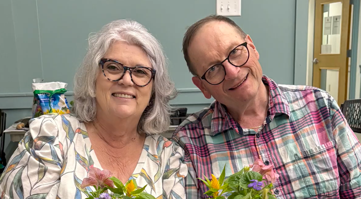 Image of a smiling man and woman