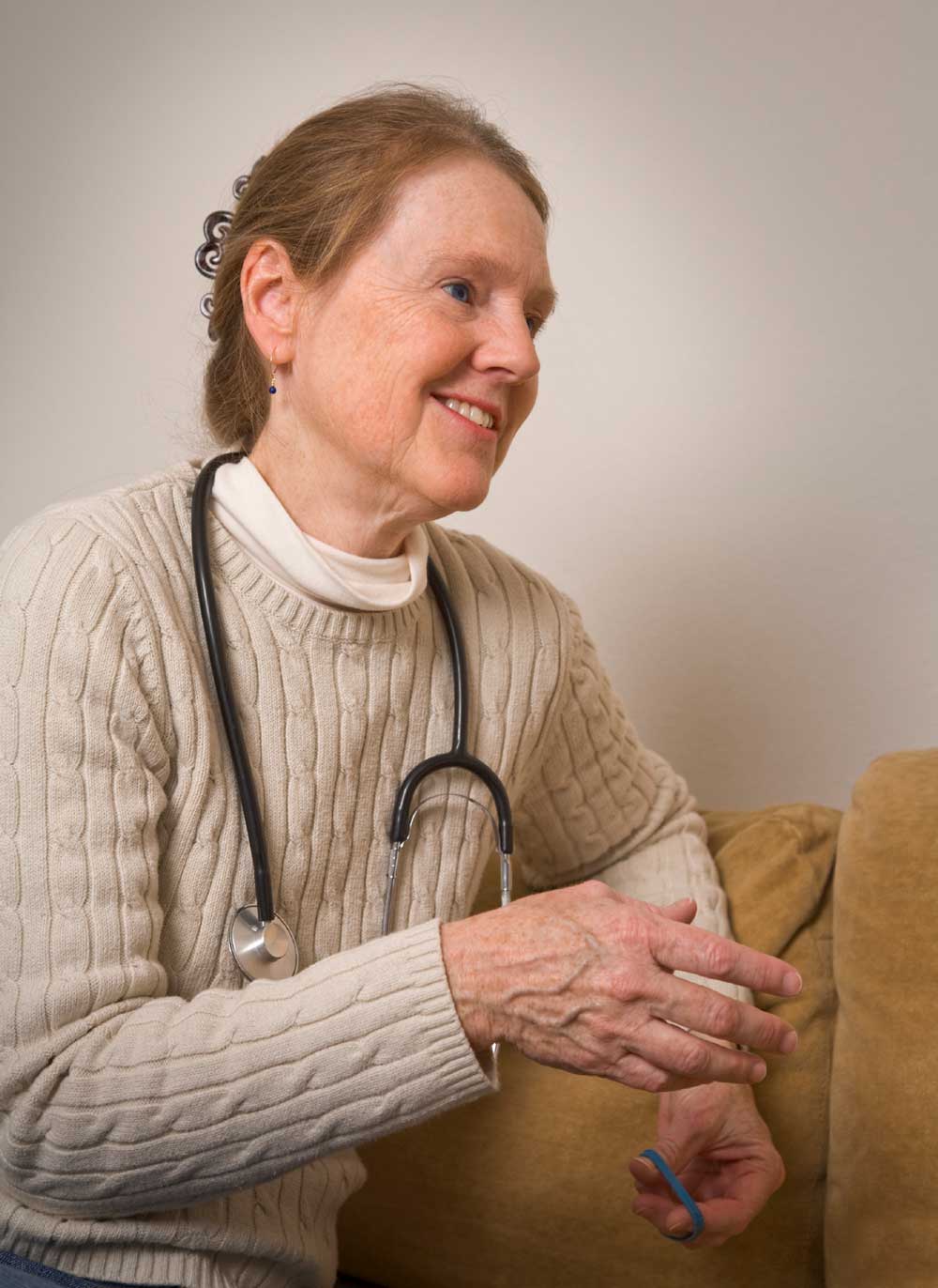 A Smiling Nurse Engaged in Conversation