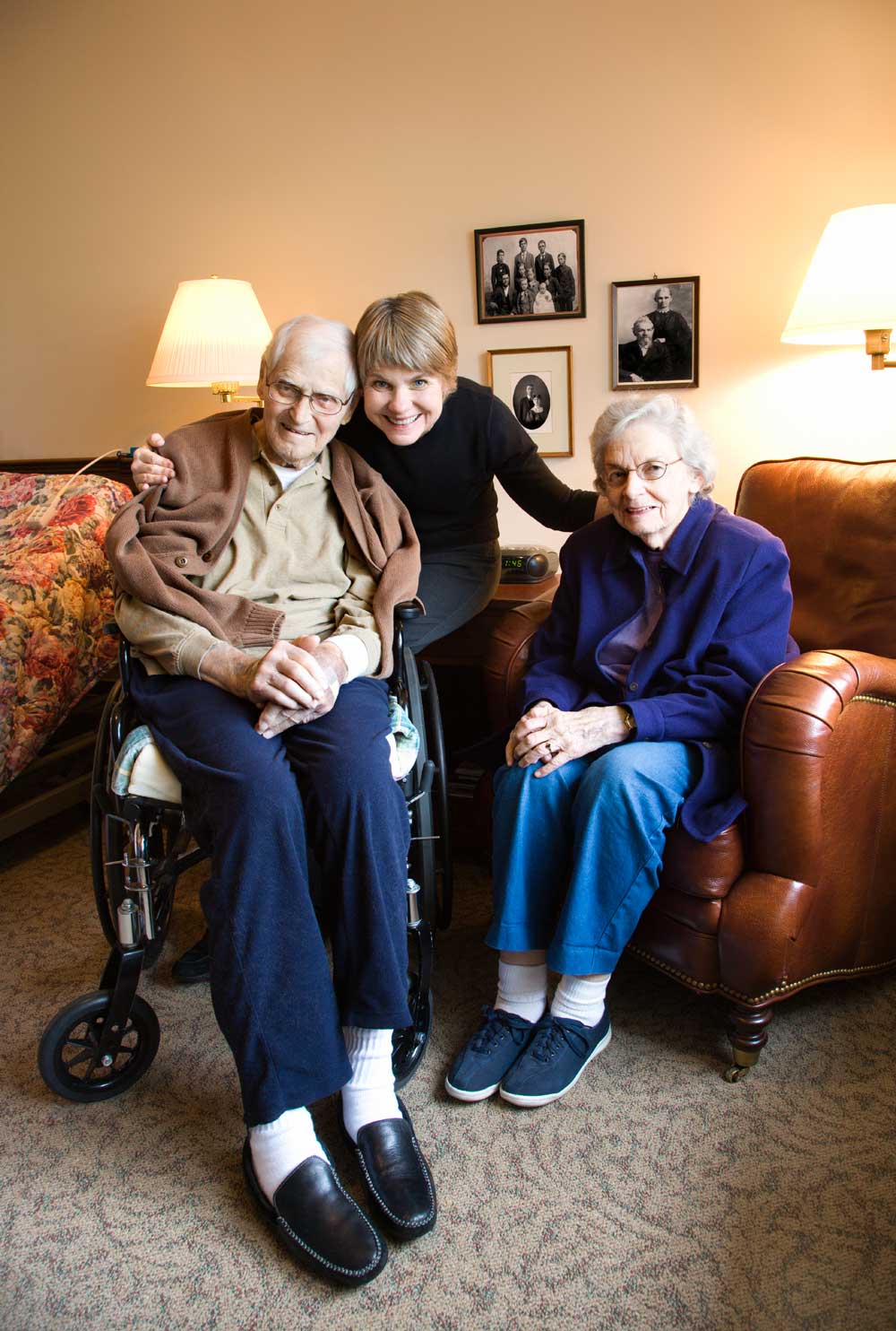 A Young Woman with an Older Woman Holding Papers