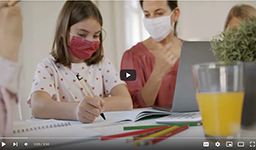 parent helping child with school work