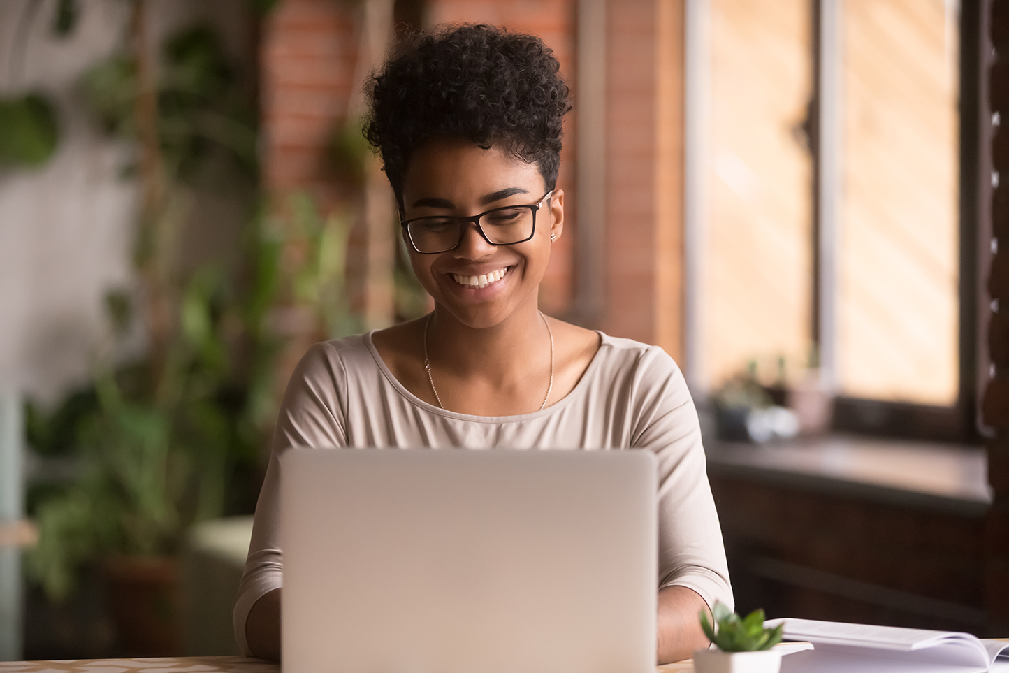 Young woman at laptop computer