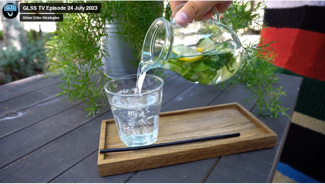 Pouring water from a jug into a glass